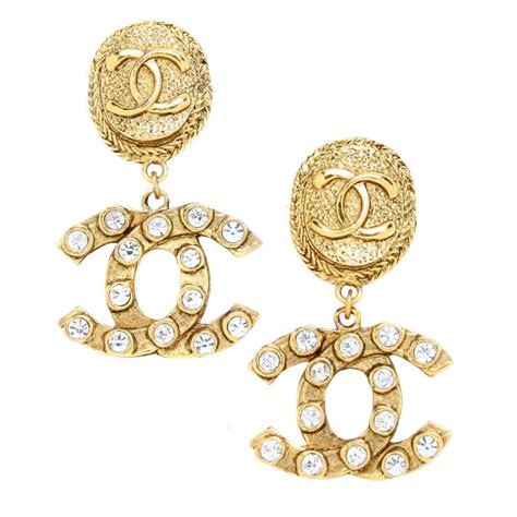 chanel earringz|Chanel symbol earrings.